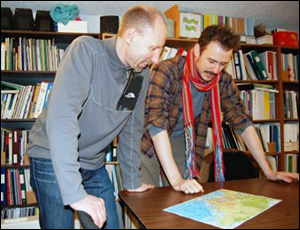 photo of Darcy Milkowski and Lachlan MacLean viewing map for Rally for Literacy adventure
